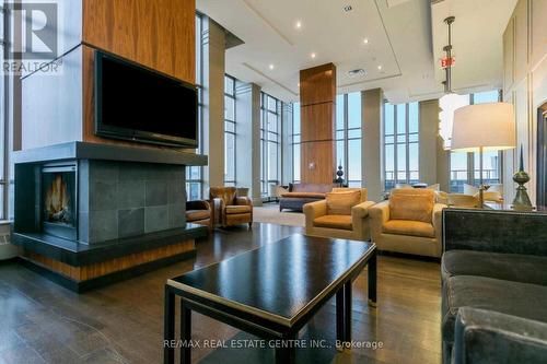 Gt#102 - 388 Prince Of Wales Drive, Mississauga, ON - Indoor Photo Showing Living Room With Fireplace