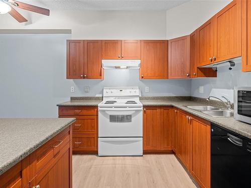 310-383 Wale Rd, Colwood, BC - Indoor Photo Showing Kitchen With Double Sink