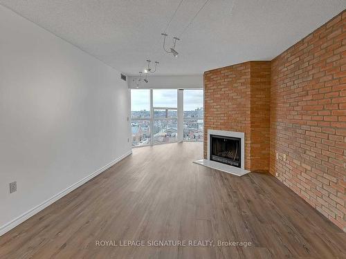 Ph5-725 King St W, Toronto, ON - Indoor Photo Showing Living Room With Fireplace