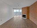 Ph5-725 King St W, Toronto, ON  - Indoor Photo Showing Living Room With Fireplace 