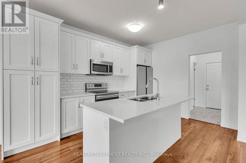 1318 Caen Avenue, Woodstock, ON - Indoor Photo Showing Kitchen With Double Sink With Upgraded Kitchen