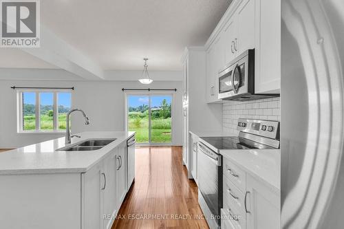 1318 Caen Avenue, Woodstock, ON - Indoor Photo Showing Kitchen With Double Sink With Upgraded Kitchen