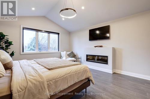 560 Woodview Road, Burlington (Roseland), ON - Indoor Photo Showing Bedroom With Fireplace