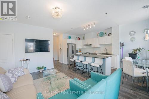 105 - 1360 Costigan Road, Milton, ON - Indoor Photo Showing Living Room