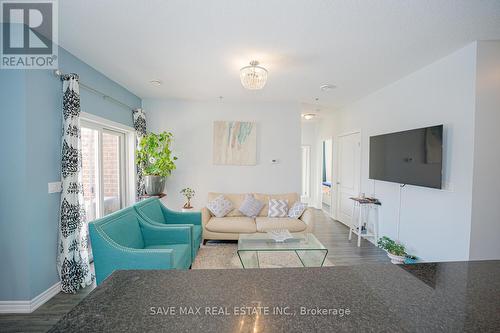 105 - 1360 Costigan Road, Milton, ON - Indoor Photo Showing Living Room