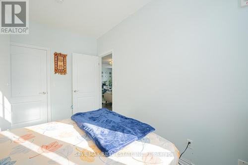 105 - 1360 Costigan Road, Milton, ON - Indoor Photo Showing Bedroom