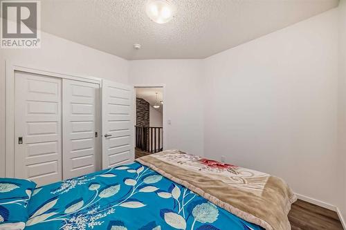 2007 Windbury Crescent Sw, Airdrie, AB - Indoor Photo Showing Bedroom