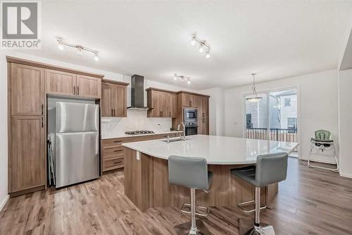 2007 Windbury Crescent Sw, Airdrie, AB - Indoor Photo Showing Kitchen With Stainless Steel Kitchen With Double Sink With Upgraded Kitchen