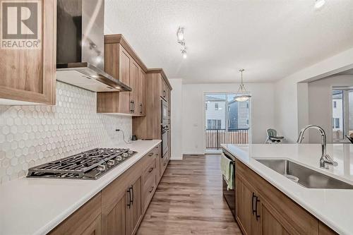 2007 Windbury Crescent Sw, Airdrie, AB - Indoor Photo Showing Kitchen With Upgraded Kitchen