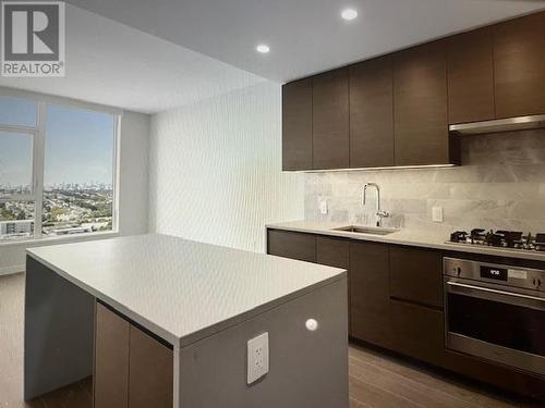 2204 2108 Gilmore Avenue, Burnaby, BC - Indoor Photo Showing Kitchen With Upgraded Kitchen