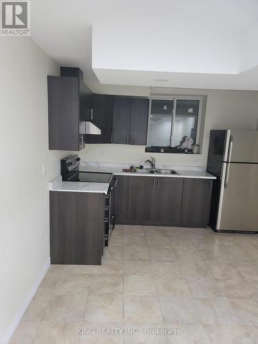 22 Felix Close, Brampton, ON - Indoor Photo Showing Kitchen With Double Sink