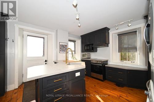 305 Centre Street, Prescott, ON - Indoor Photo Showing Kitchen With Double Sink