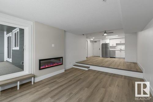 #208 9504 182 St Nw, Edmonton, AB - Indoor With Fireplace