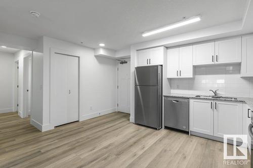 #208 9504 182 St Nw, Edmonton, AB - Indoor Photo Showing Kitchen With Stainless Steel Kitchen With Double Sink