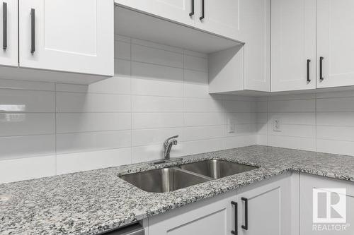 #208 9504 182 St Nw, Edmonton, AB - Indoor Photo Showing Kitchen With Double Sink