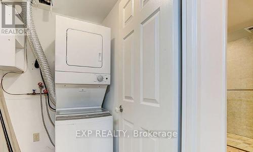 2508 - 24 Wellesley Street W, Toronto, ON - Indoor Photo Showing Laundry Room