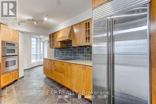 2508 - 24 Wellesley Street W, Toronto, ON - Indoor Photo Showing Kitchen