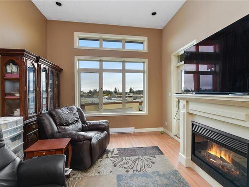 621-623 Treanor Ave, Langford, BC - Indoor Photo Showing Living Room With Fireplace