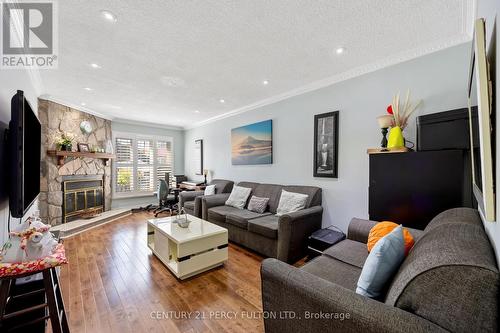 33 Budworth Drive, Toronto, ON - Indoor Photo Showing Living Room With Fireplace