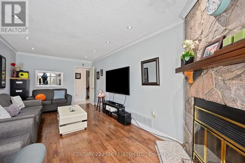 33 Budworth Drive, Toronto, ON - Indoor Photo Showing Living Room With Fireplace