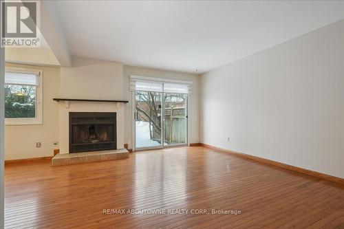 22 - 3050 Orleans Road, Mississauga, ON - Indoor Photo Showing Living Room With Fireplace