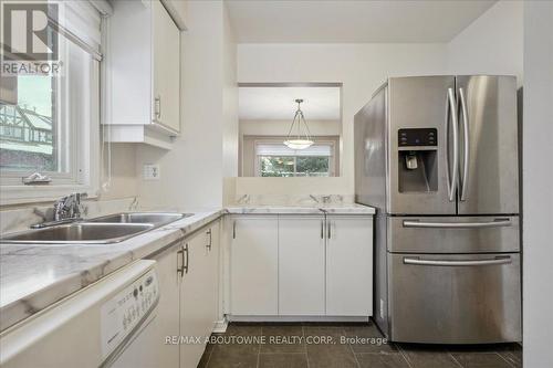 22 - 3050 Orleans Road, Mississauga, ON - Indoor Photo Showing Kitchen With Double Sink