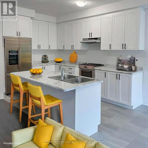 11 Lisa Street, Wasaga Beach, ON - Indoor Photo Showing Kitchen With Stainless Steel Kitchen With Double Sink