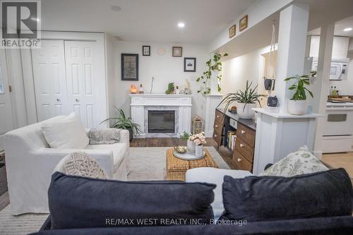 2 - 93 Peel Street, Barrie, ON - Indoor Photo Showing Living Room With Fireplace