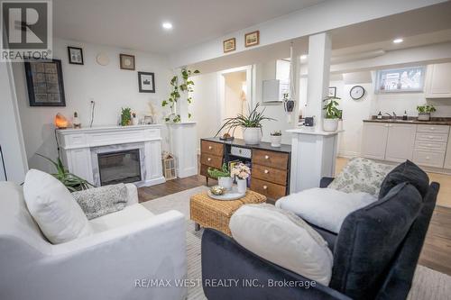 2 - 93 Peel Street, Barrie, ON - Indoor Photo Showing Living Room With Fireplace