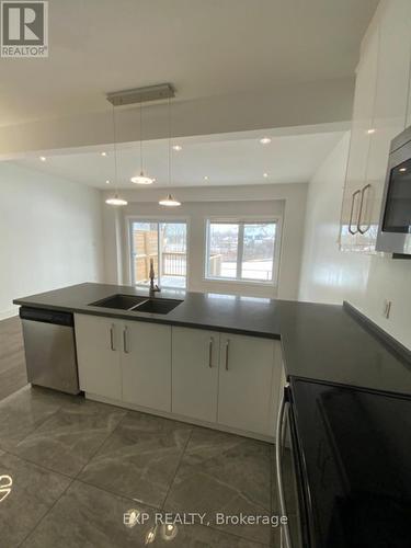 10 - 2621 Holbrook Drive, London, ON - Indoor Photo Showing Kitchen With Double Sink