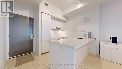 713 - 33 Frederick Todd Way, Toronto, ON - Indoor Photo Showing Kitchen