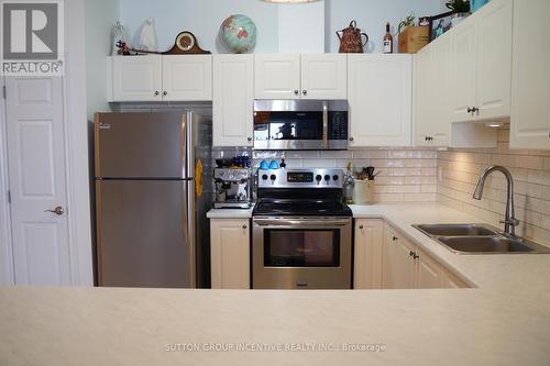 104 Lily Drive, Orillia, ON - Indoor Photo Showing Kitchen With Double Sink