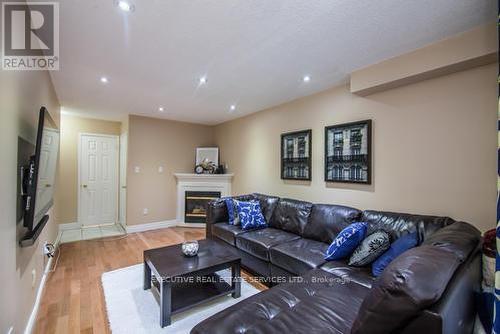 91 Lockwood Road, Brampton, ON - Indoor Photo Showing Living Room With Fireplace