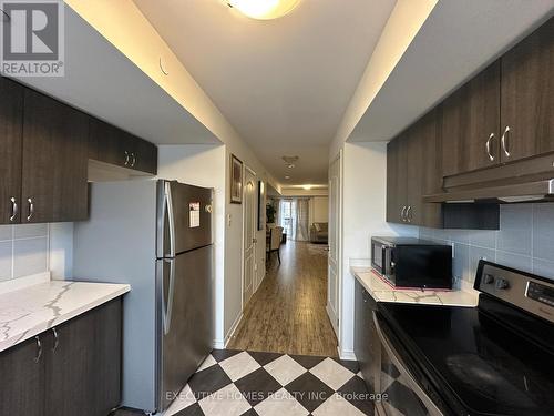 309 - 2294 Chevron Prince Path, Oshawa, ON - Indoor Photo Showing Kitchen