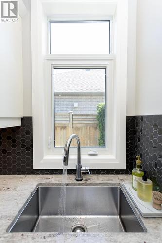 58 Timberwalk Trail, Middlesex Centre (Ilderton), ON - Indoor Photo Showing Kitchen With Double Sink