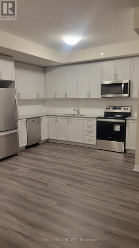 127 - 1569 Rose Way, Milton, ON - Indoor Photo Showing Kitchen With Stainless Steel Kitchen