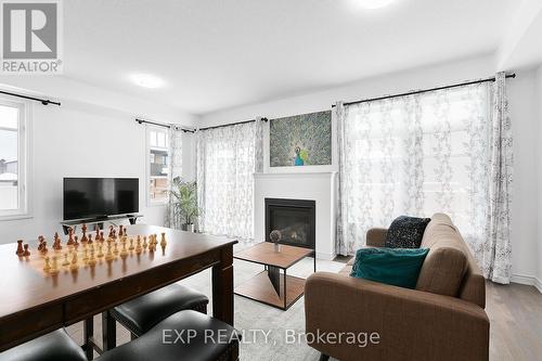 59 Tapadero Avenue, Ottawa, ON - Indoor Photo Showing Living Room With Fireplace