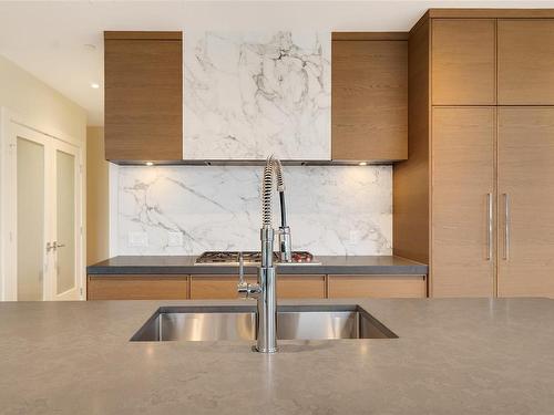 205-1916 Oak Bay Ave, Victoria, BC - Indoor Photo Showing Kitchen With Double Sink