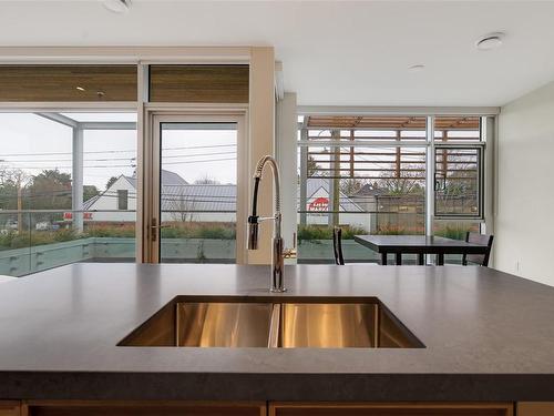 205-1916 Oak Bay Ave, Victoria, BC - Indoor Photo Showing Kitchen With Double Sink