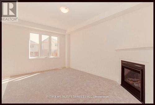 30 Povey Rd Drive, Centre Wellington, ON - Indoor With Fireplace