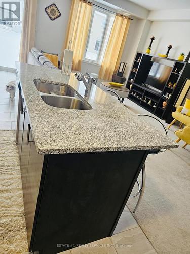 30 Povey Rd Drive, Centre Wellington, ON - Indoor Photo Showing Kitchen With Double Sink