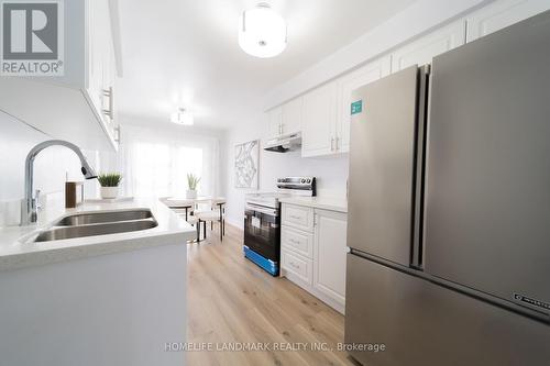 39 - 1230 Kirstie Court, Oakville, ON - Indoor Photo Showing Kitchen With Double Sink