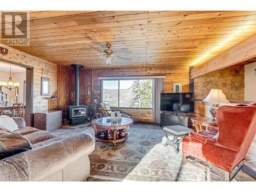 6534 Apollo Road, Vernon, BC - Indoor Photo Showing Living Room With Fireplace