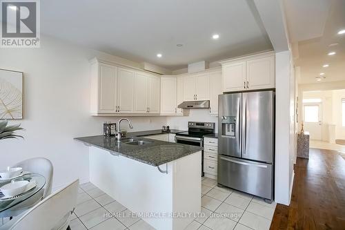 49 Emerald Coast Trail, Brampton, ON - Indoor Photo Showing Kitchen With Double Sink