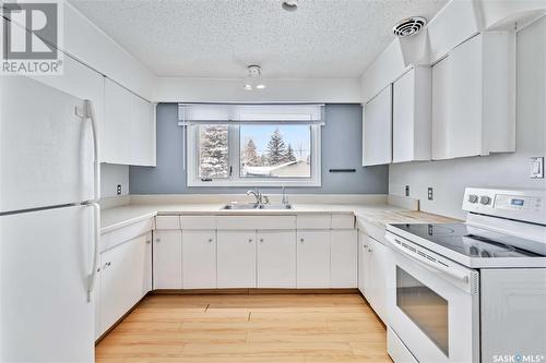 2506 Ewart Avenue, Saskatoon, SK - Indoor Photo Showing Kitchen With Double Sink