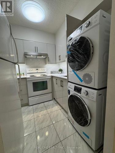 2430 - 33 Harbour Square, Toronto, ON - Indoor Photo Showing Laundry Room