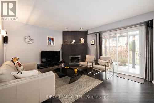 13 Sparklett Crescent, Brampton, ON - Indoor Photo Showing Living Room With Fireplace