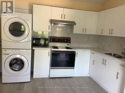 Bsmt - 2 Bramber Road, Toronto, ON - Indoor Photo Showing Laundry Room