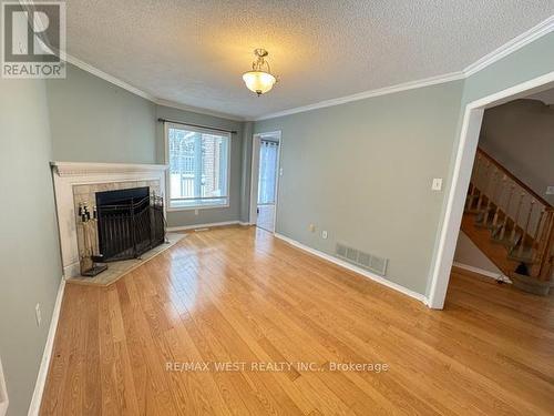 24 Neelands Street, Barrie, ON - Indoor With Fireplace