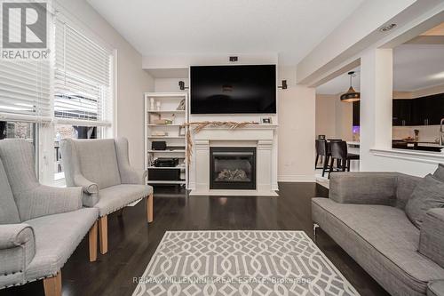 36 Elwin Road, Brampton, ON - Indoor Photo Showing Living Room With Fireplace